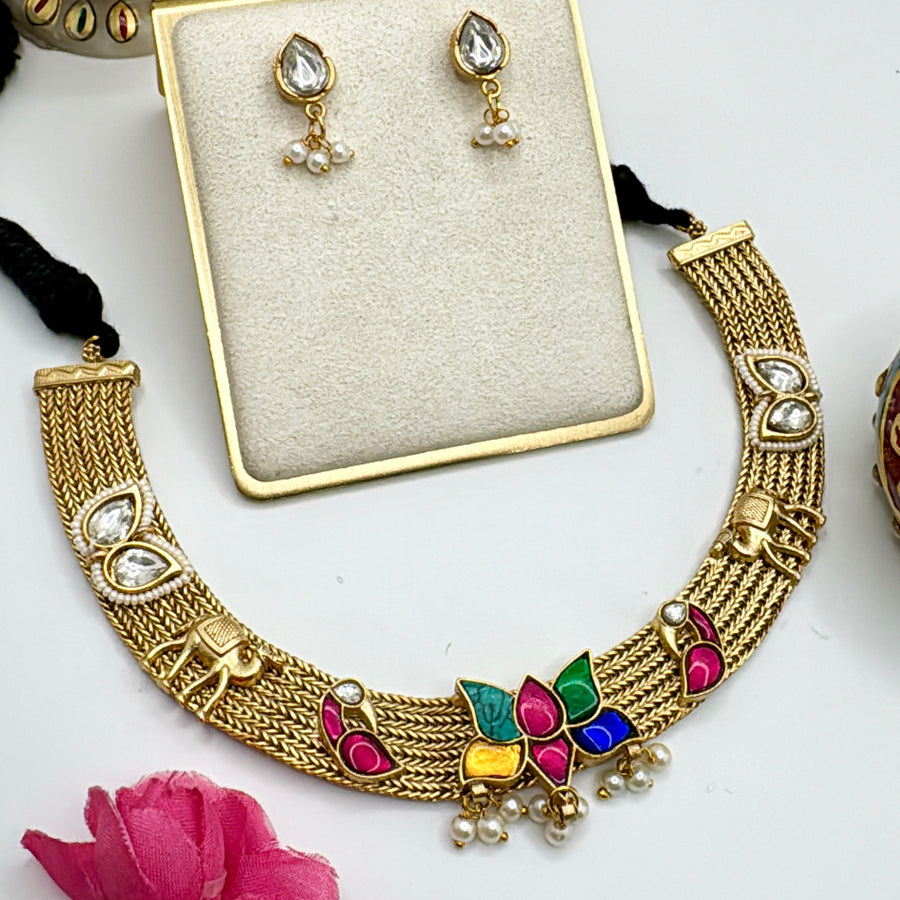 Clear Silver Lookalike Gold Necklace Set With Multi Paachi Motifs