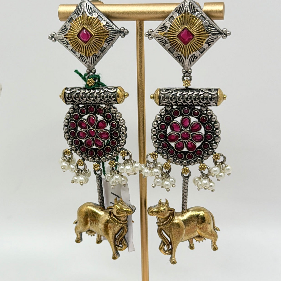 Ruby Dual Tone Silver Lookalike Nandi Cow Earrings