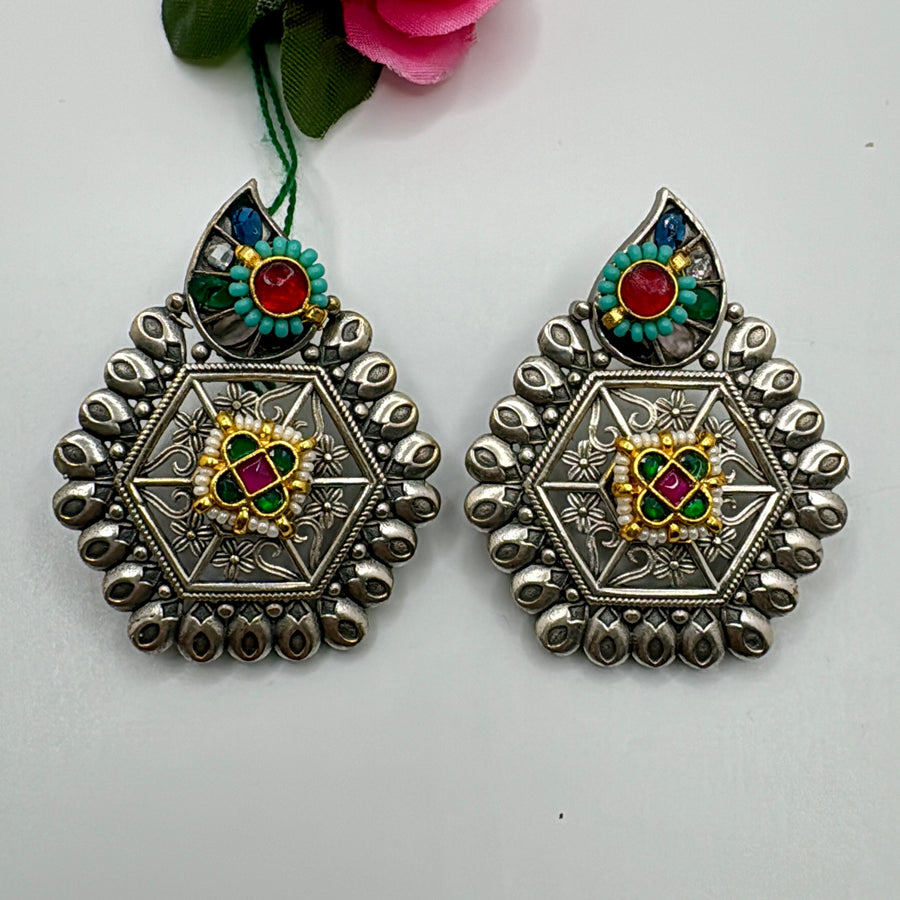 Turquoise & Red 
Paachi Motif Silver Lookalike Studs