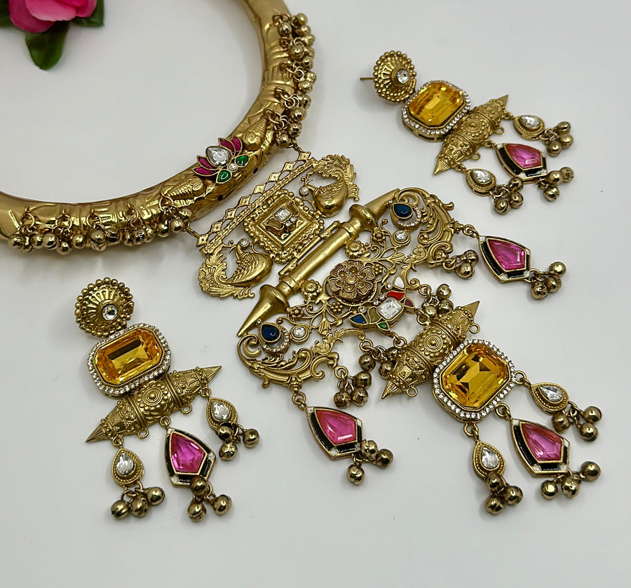 Yellow & Pink 92.5 Gold Polish Silver Lookalike Ghungroo Statement Hasli Set with Swarovski Stones